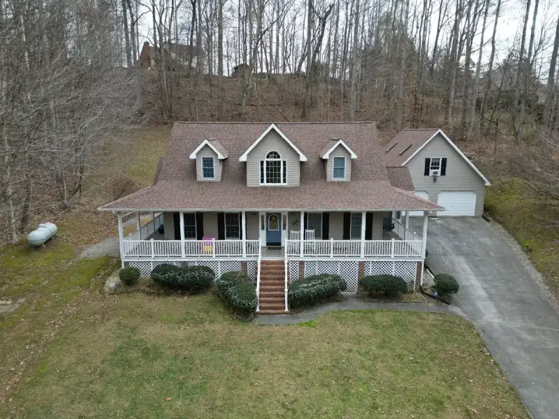 Drone aerial of a King Valley area home in the Tri-Cities, Tennessee with a recently installed Palisade Roofing project.