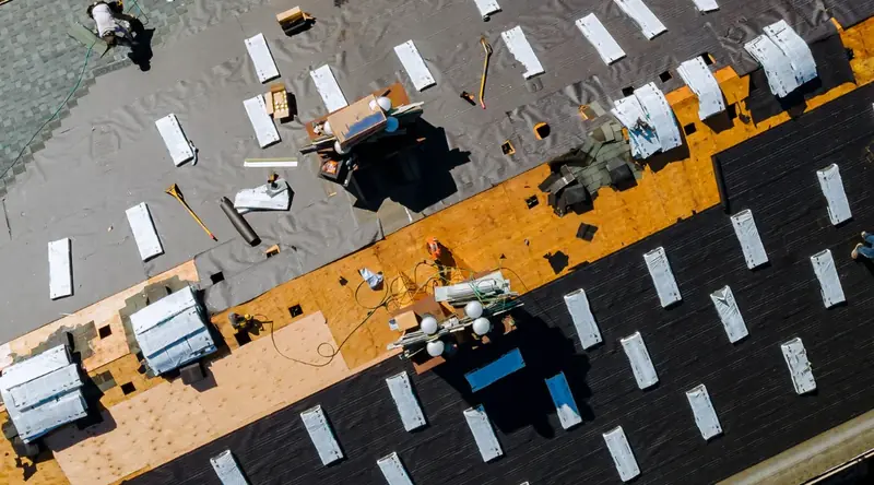 A Palisade Roofing crew installing a roof in East Tennessee.